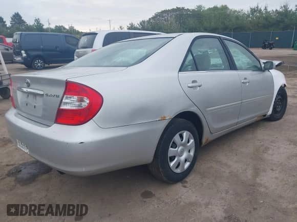 2002 Toyota Camry LE с VIN 4T1BE32K72U530094, выставлен на аукционе IAAI как лот 42334393 с пробегом Не указан миль и . История ставок и продаж доступна на DreamBid. Изображение 4.