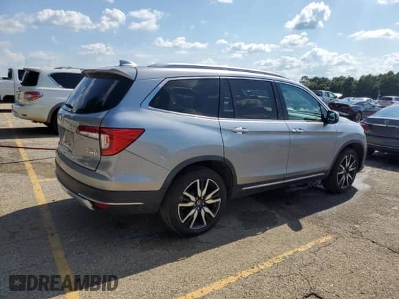 2019 Honda Pilot Elite с VIN 5FNYF6H07KB056725, выставлен на аукционе Copart как лот 69295575 с пробегом 120 231 миль миль и Списание • Salvage title. История ставок и продаж доступна на DreamBid. Изображение 3.