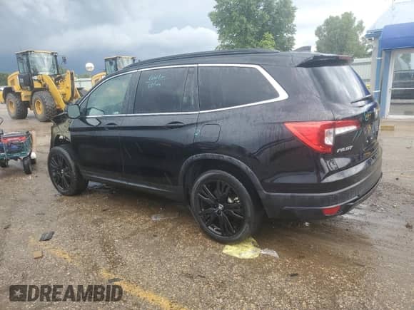 2022 Honda Pilot Special Edition with VIN 5FNYF6H29NB001957, listed as a Copart auction lot 60894795 with 65,448 mi miles and Salvage title. Bid and sale history available at DreamBid. Image 2.