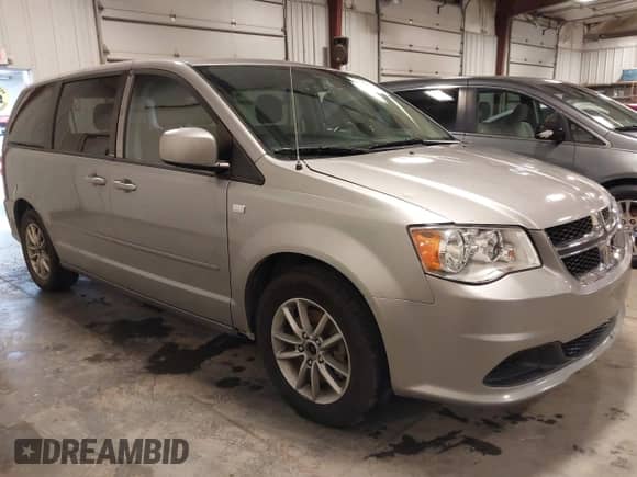 2014 Dodge Grand Caravan SE 30th Anniversary with VIN 2C4RDGBG3ER190470, listed as a IAAI auction lot 39764890 with 176,185 mi miles and . Bid and sale history available at DreamBid. Image 1.