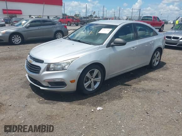 2015 Chevrolet Cruze LS with VIN 1G1PB5SH9F7213269, listed as a IAAI auction lot 42627784 with 164,932 mi miles and . Bid and sale history available at DreamBid. Image 2.