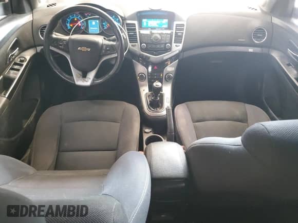 2014 Chevrolet Cruze 1LT z VIN 1G1PD5SB4E7204807, wystawiony jako Copart lot #65360725 z przebiegiem 164 943 mil mil oraz Szkoda całkowita • Salvage title. Historia ofert i sprzedaży dostępna na DreamBid. Obrazek 8.