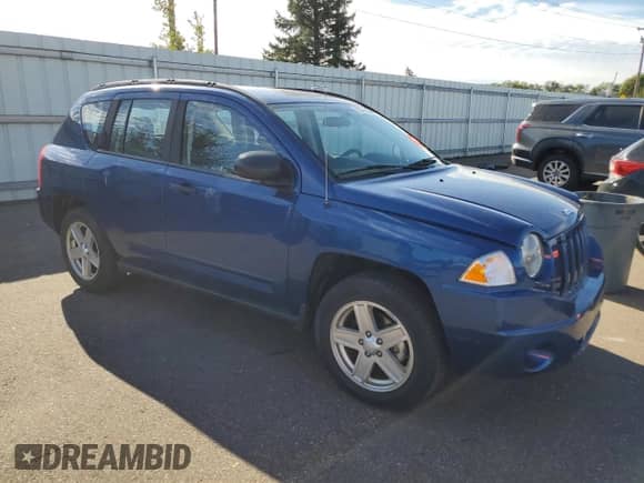 2009 Jeep Compass Sport с VIN 1J4FF47B19D200747, выставлен на аукционе Copart как лот 85378575 с пробегом 131 814 миль миль и На запчасти • Non repairable. История ставок и продаж доступна на DreamBid. Изображение 4.