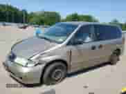 2004 Honda Odyssey LX with VIN 5FNRL18534B143388, listed as a Copart auction lot 68346135 with 160,563 mi miles and Salvage title. Bid and sale history available at DreamBid. Image 1.