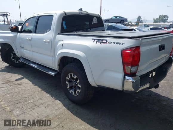 2017 Toyota Tacoma SR5 with VIN 3TMAZ5CN6HM030241, listed as a IAAI auction lot 42357004 with 120,779 mi miles and . Bid and sale history available at DreamBid. Image 3.
