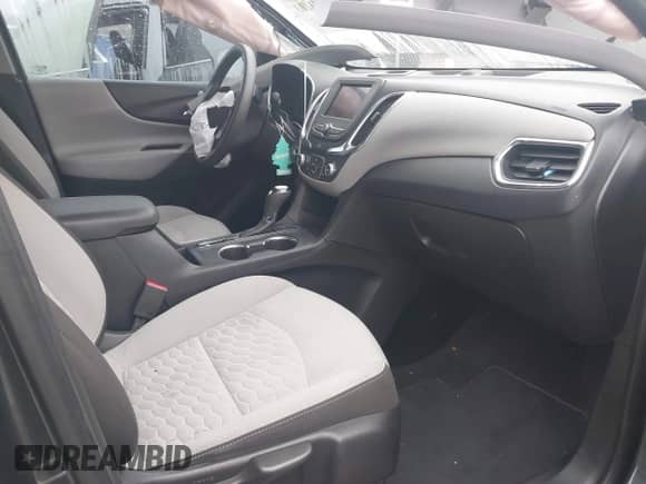 2020 Chevrolet Equinox LS z VIN 2GNAX5EV4L6141853, wystawiony jako IAAI lot #41183203 z przebiegiem 134 763 mil mil oraz . Historia ofert i sprzedaży dostępna na DreamBid. Obrazek 5.