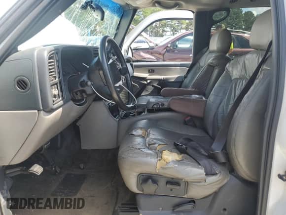 2002 Chevrolet Suburban Z71 z VIN 3GNFK16Z12G321065, wystawiony jako Copart lot #66878305 z przebiegiem Nie podano mil oraz Szkoda całkowita • Salvage title. Historia ofert i sprzedaży dostępna na DreamBid. Obrazek 7.