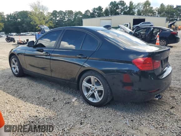 2015 BMW 3 Series 328i xDrive with VIN WBA3B3G59FNR89418, listed as a Copart auction lot 80554855 with 152,948 mi miles and Salvage title. Bid and sale history available at DreamBid. Image 2.