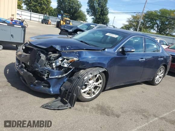 2014 Nissan Maxima SV with VIN 1N4AA5AP1EC471614, listed as a Copart auction lot 84806125 with 74,303 mi miles and Salvage title. Bid and sale history available at DreamBid. Image 1.