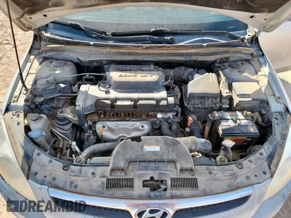 2009 Hyundai Elantra Touring с VIN KMHDC86E79U035761, выставлен на аукционе Copart как лот 82250695 с пробегом 152 560 миль миль и Чистый • Clean title. История ставок и продаж доступна на DreamBid. Изображение 12.