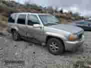 2000 Cadillac Escalade z VIN 1GYEK13RXYR103671, wystawiony jako Copart lot #48146125 z przebiegiem 271 195 mil mil oraz Szkoda całkowita • Salvage title. Historia ofert i sprzedaży dostępna na DreamBid. Obrazek 4.