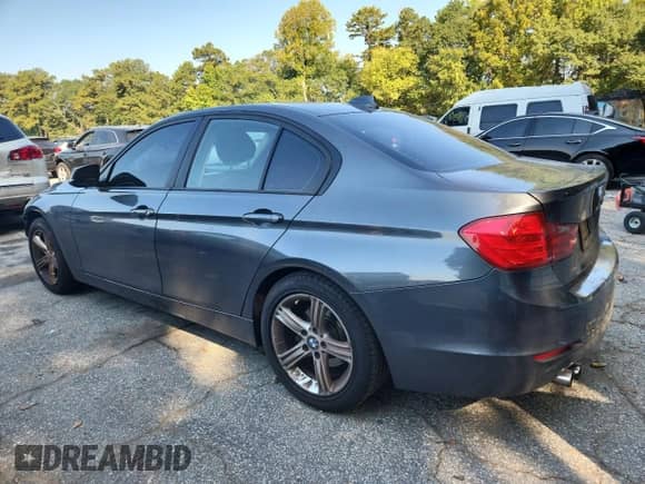2013 BMW 3 Series 328i with VIN WBA3C1C55DF439261, listed as a Copart auction lot 72067335 with 182,777 mi miles and Salvage title. Bid and sale history available at DreamBid. Image 2.