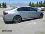 2021 BMW 7 Series 740i with VIN WBA7T2C07MCG46962, listed as a Copart auction lot 66881895 with 48,616 mi miles and Salvage title. Bid and sale history available at DreamBid. Image 3.