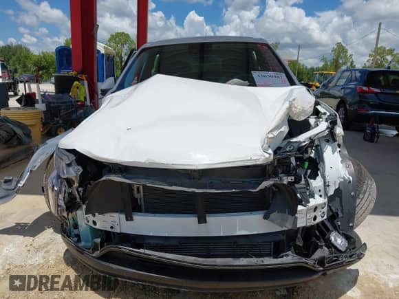 2024 Chevrolet Trax LS with VIN KL77LFE29RC082645, listed as a IAAI auction lot 43030987 with 22,965 mi miles and . Bid and sale history available at DreamBid. Image 12.