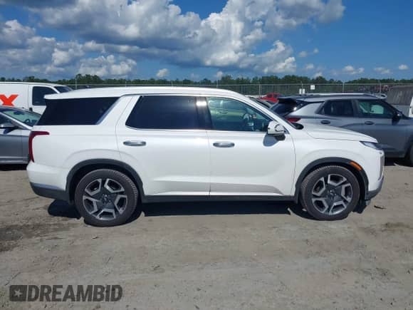 2023 Hyundai Palisade SEL z VIN KM8R4DGE8PU608514, wystawiony jako IAAI lot #42558179 z przebiegiem 34 277 mil mil oraz . Historia ofert i sprzedaży dostępna na DreamBid. Obrazek 13.