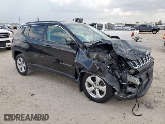 2021 Jeep Compass Latitude with VIN 3C4NJDBBXMT584022, listed as a Copart auction lot 69013615 with 74,898 mi miles and Salvage title. Bid and sale history available at DreamBid. Image 4.