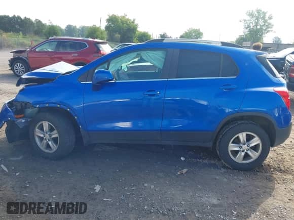 2015 Chevrolet Trax LT with VIN KL7CJRSB8FB239836, listed as a IAAI auction lot 43016210 with 90,645 mi miles and . Bid and sale history available at DreamBid. Image 14.