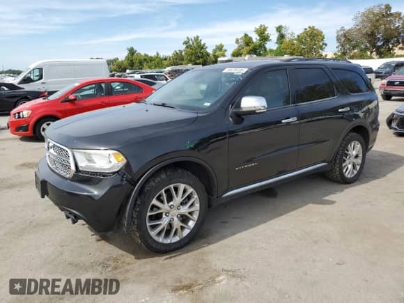 2015 Dodge Durango Citadel with VIN 1C4RDJEG9FC195076, listed as a Copart auction lot 70479735 with 210,216 mi miles and Salvage title. Bid and sale history available at DreamBid. Image 1.