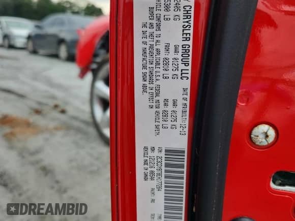 2014 Dodge Challenger R/T with VIN 2C3CDYBT8EH177264, listed as a Copart auction lot 70327855 with 105,628 mi miles and Salvage title. Bid and sale history available at DreamBid. Image 13.