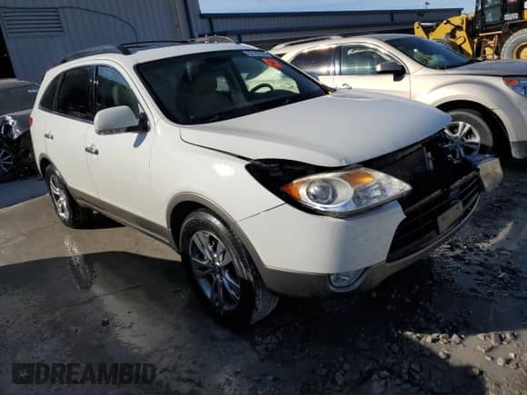 2012 Hyundai Veracruz Limited с VIN KM8NU4CC2CU193901, выставлен на аукционе Copart как лот 82182384 с пробегом 151 346 миль миль и Списание • Salvage title. История ставок и продаж доступна на DreamBid. Изображение 4.