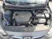 2014 Hyundai Accent GLS z VIN KMHCT4AE8EU635159, wystawiony jako Copart lot #85870495 z przebiegiem 110 393 mil mil oraz Szkoda całkowita • Salvage title. Historia ofert i sprzedaży dostępna na DreamBid. Obrazek 11.