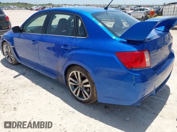 2014 Subaru WRX WRX STI z VIN JF1GV8J65EL007040, wystawiony jako IAAI lot #42781696 z przebiegiem 74 247 mil mil oraz . Historia ofert i sprzedaży dostępna na DreamBid. Obrazek 3.