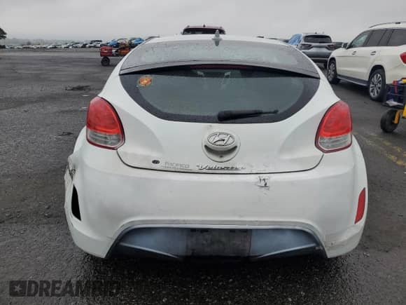 2013 Hyundai Veloster w/Black Int z VIN KMHTC6AD6DU180586, wystawiony jako Copart lot #81717425 z przebiegiem 91 070 mil mil oraz Szkoda całkowita • Salvage title. Historia ofert i sprzedaży dostępna na DreamBid. Obrazek 6.