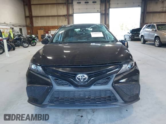 2021 Toyota Camry SE z VIN 4T1G11AKXMU471598, wystawiony jako IAAI lot #43060273 z przebiegiem 87 450 mil mil oraz . Historia ofert i sprzedaży dostępna na DreamBid. Obrazek 12.