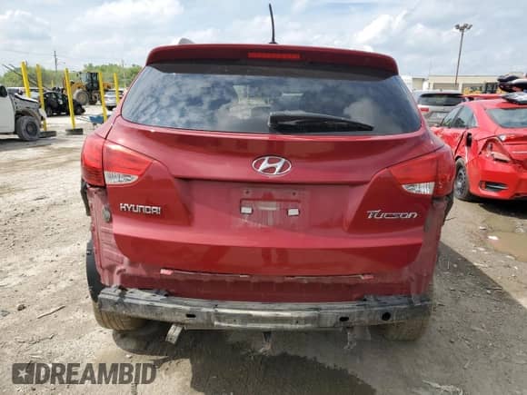 2010 Hyundai Tucson Limited z VIN KM8JU3AC0AU092929, wystawiony jako Copart lot #61043235 z przebiegiem 143 077 mil mil oraz Szkoda całkowita • Salvage title. Historia ofert i sprzedaży dostępna na DreamBid. Obrazek 6.