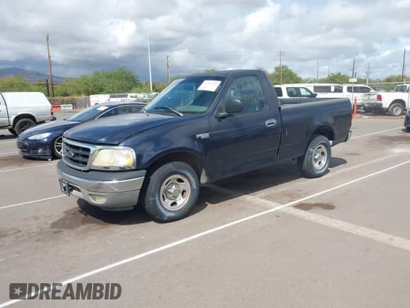 2003 Ford F-150 XL with VIN 1FTRF17283NB11096, listed as a IAAI auction lot 43315259 with 130,415 mi miles and . Bid and sale history available at DreamBid. Image 2.