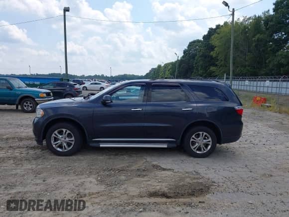 2013 Dodge Durango Crew with VIN 1C4RDJDGXDC691941, listed as a IAAI auction lot 43139534 with 111,750 mi miles and . Bid and sale history available at DreamBid. Image 14.