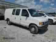 2002 Ford Econoline Cargo with VIN 1FTRE14202HA70502, listed as a Copart auction lot 65346325 with 195,220 mi miles and Salvage title. Bid and sale history available at DreamBid. Image 4.