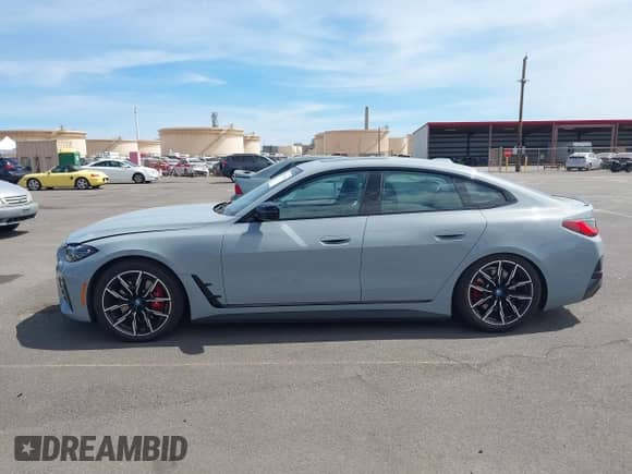 2024 BMW i4 eDrive40 with VIN WBY73AW07RFT27491, listed as a IAAI auction lot 43109104 with 10,833 mi miles and . Bid and sale history available at DreamBid. Image 14.