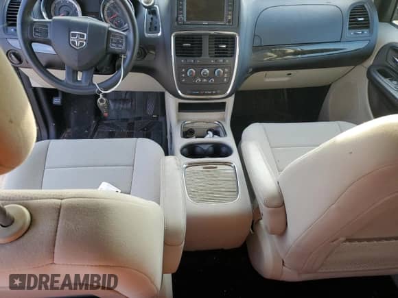 2012 Dodge Grand Caravan SXT with VIN 2C4RDGCG5CR167607, listed as a Copart auction lot 81718455 with 77,349 mi miles and Salvage title. Bid and sale history available at DreamBid. Image 8.