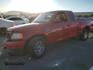 2002 Ford F-150 XL with VIN 1FTRX07W22KA41637, listed as a Copart auction lot 43665235 with 277,896 mi miles and Salvage title. Bid and sale history available at DreamBid. Image 1.