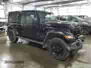 2023 Jeep Wrangler Sahara Altitude with VIN 1C4HJXEG9PW595565, listed as a Copart auction lot 77230394 with 28,477 mi miles and Salvage title. Bid and sale history available at DreamBid. Image 4.