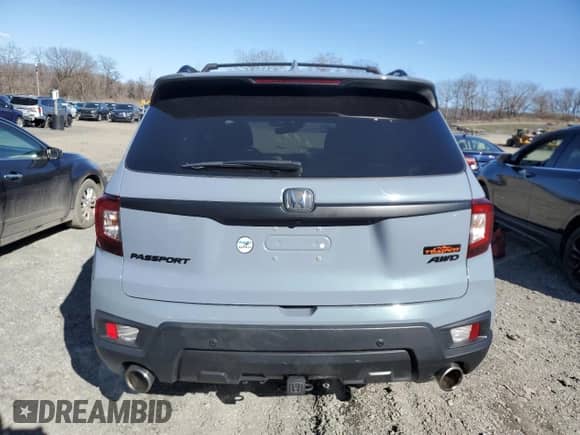 2022 Honda Passport TrailSport with VIN 5FNYF8H62NB004097, listed as a Copart auction lot 52331095 with 27,318 mi miles and Salvage title. Bid and sale history available at DreamBid. Image 6.