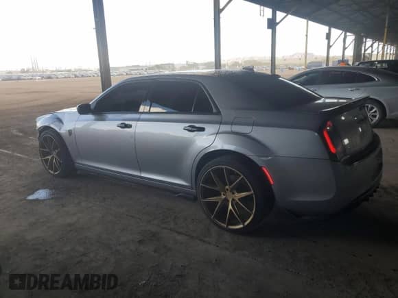 2016 Chrysler 300 Limited z VIN 2C3CCAAG5GH211923, wystawiony jako Copart lot #80090925 z przebiegiem 148 257 mil mil oraz Szkoda całkowita • Salvage title. Historia ofert i sprzedaży dostępna na DreamBid. Obrazek 2.