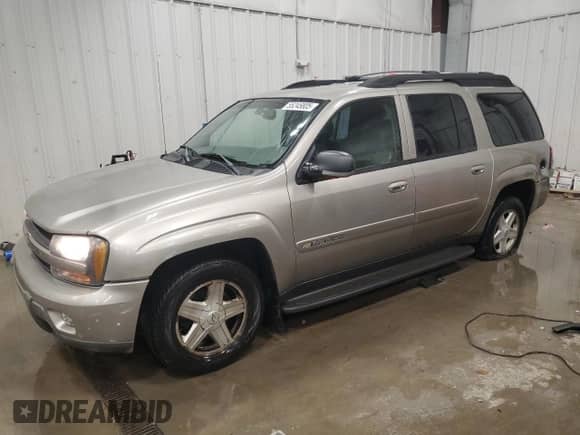 2003 Chevrolet TrailBlazer EXT LT z VIN 1GNET16S936165887, wystawiony jako Copart lot #55245805 z przebiegiem 171 484 mil mil oraz Nie do naprawy • Non repairable. Historia ofert i sprzedaży dostępna na DreamBid. Obrazek 1.