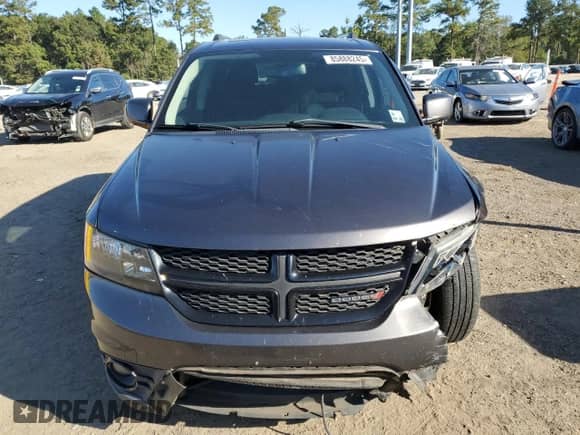 2017 Dodge Journey Crossroad с VIN 3C4PDCGG3HT601358, выставлен на аукционе Copart как лот 85888245 с пробегом 99 527 миль миль и Списание • Salvage title. История ставок и продаж доступна на DreamBid. Изображение 5.