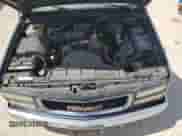 1998 GMC Sierra 1500 z VIN 1GTEC19W5WE518398, wystawiony jako Copart lot #73168034 z przebiegiem 356 084 mil mil oraz Szkoda całkowita • Salvage title. Historia ofert i sprzedaży dostępna na DreamBid. Obrazek 11.
