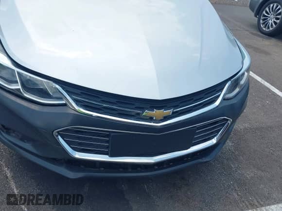 2018 Chevrolet Cruze LS z VIN 1G1BC5SM0J7140578, wystawiony jako IAAI lot #42994459 z przebiegiem 84 860 mil mil oraz . Historia ofert i sprzedaży dostępna na DreamBid. Obrazek 12.