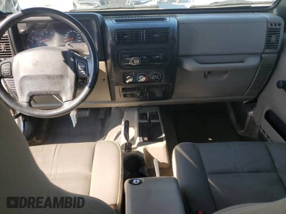 2004 Jeep Wrangler Sahara с VIN 1J4FA59S34P742442, выставлен на аукционе Copart как лот 51053095 с пробегом 161 263 миль миль и Списание • Salvage title. История ставок и продаж доступна на DreamBid. Изображение 8.