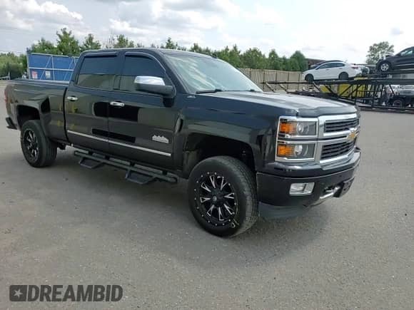 2014 Chevrolet Silverado 1500 High Country с VIN 3GCUKTEJ6EG480448, выставлен на аукционе Copart как лот 68707985 с пробегом 186 075 миль миль и Списание • Salvage title. История ставок и продаж доступна на DreamBid. Изображение 14.