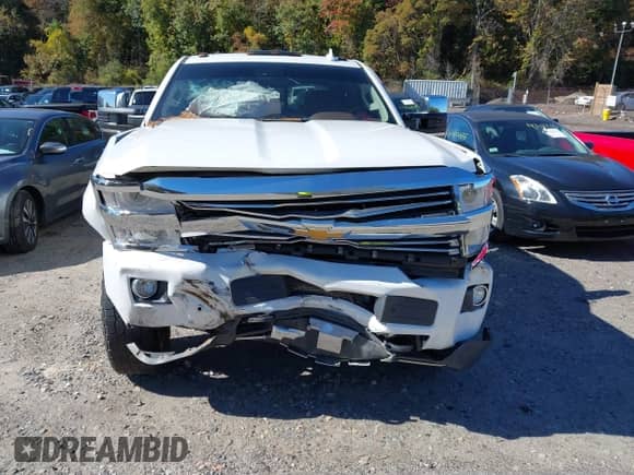 2016 Chevrolet Silverado 2500HD High Country with VIN 1GC1KXE83GF218284, listed as a IAAI auction lot 43360216 with 124,600 mi miles and . Bid and sale history available at DreamBid. Image 12.