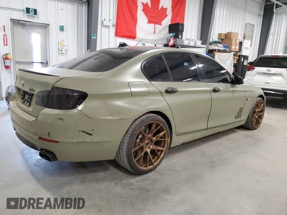 2011 BMW 5 Series 550i with VIN WBAFR9C55BC270884, listed as a Copart auction lot 65214165 with 238,207 mi miles and Clean title. Bid and sale history available at DreamBid. Image 3.