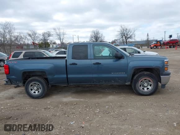 2014 Chevrolet Silverado 1500 Work Truck z VIN 1GCVKPEH1EZ141556, wystawiony jako IAAI lot #41866774 z przebiegiem 158 279 mil mil oraz . Historia ofert i sprzedaży dostępna na DreamBid. Obrazek 13.
