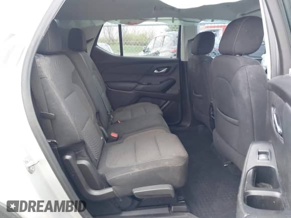 2021 Chevrolet Traverse LS with VIN 1GNEVFKWXMJ115319, listed as a IAAI auction lot 42005816 with 91,810 mi miles and . Bid and sale history available at DreamBid. Image 8.