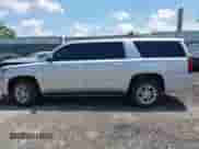 2015 Chevrolet Suburban LT z VIN 1GNSKJKC1FR604376, wystawiony jako IAAI lot #42775391 z przebiegiem 126 931 mil mil oraz . Historia ofert i sprzedaży dostępna na DreamBid. Obrazek 14.