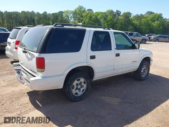 2003 Chevrolet Blazer LS с VIN 1GNDT13X53K152850, выставлен на аукционе IAAI как лот 41982795 с пробегом 261 155 миль миль и . История ставок и продаж доступна на DreamBid. Изображение 4.